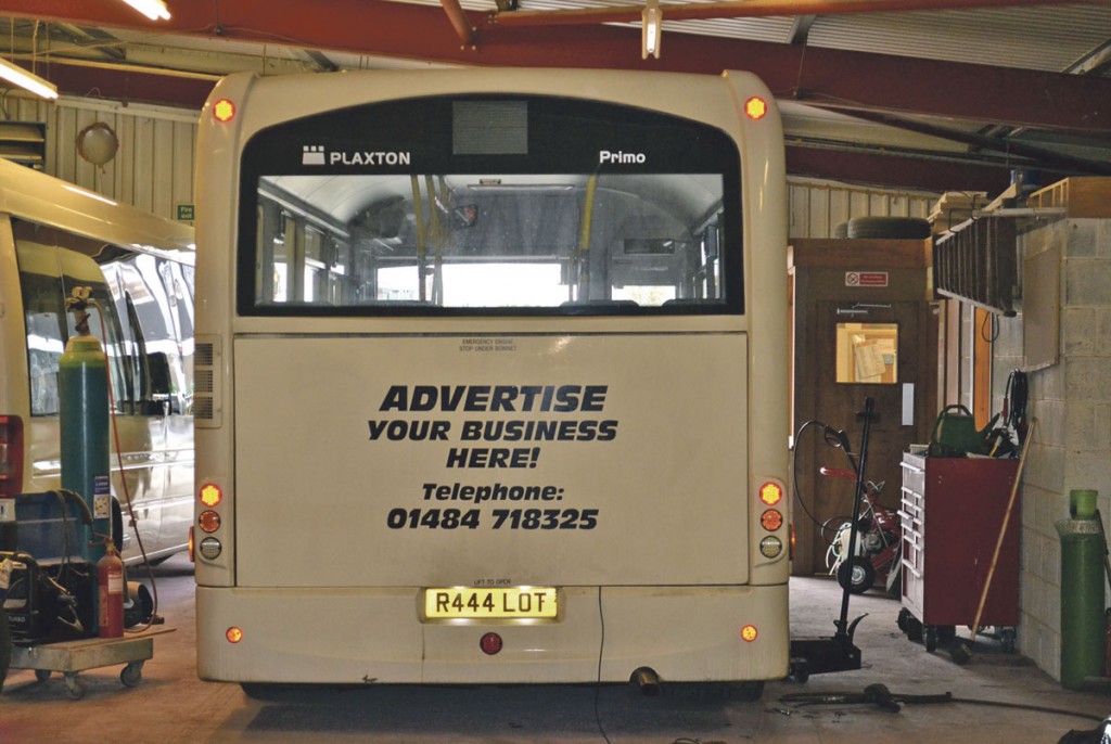 Bus advertising is an important additional revenue stream for the company. The workshop stores and office can be seen to the right of this picture and vehicle lifts have been purchased for when the pit is in use