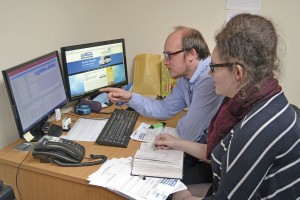 Jamie White shows new Business Administration Apprentice, Neme Eaton, the ropes