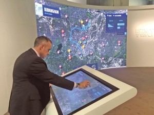 Adrian Felton demonstrates the Volvo City Mobility simulator showing the relative benefits of Volvo’s electromobility range in cities across the globe
