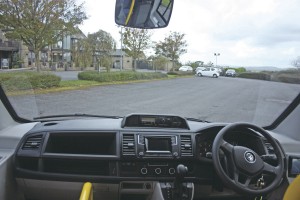 The well laid out cab is largely VW transporter. Note the well integrated body system switches on the driver’s right and the reversing camera screen. Vision through the large deep screen is excellent -2