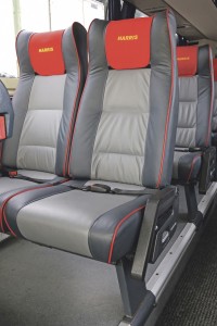 Two tone grey has been used on the seats, with red piping to match the branded headrest covers.