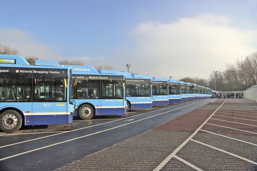 The BYDs parked in echelon in their charging bays in the new yard facility at Queens Drive