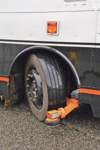 Close up of the reinstalled guide wheels, note the reflector.