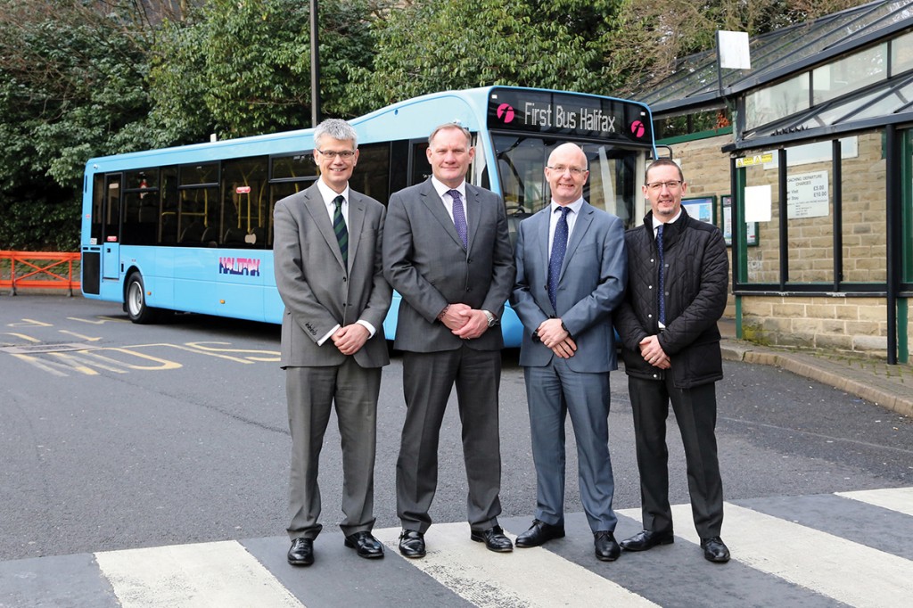 (LtoR) Robert Drewery (Optare), Graham Belgum (Optare), Mark Munday (First Bus) and Mick Campbell (First Bus) mark completion of a successful demonstration partnership in Halifax Bus Station.