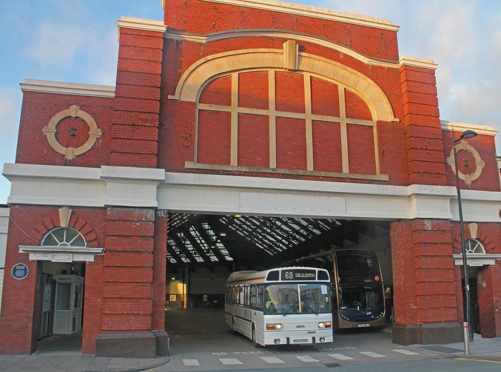 REV01 leaving the first purpose built covered bus station in the country at Workington.