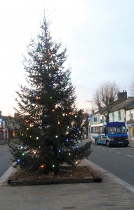 The Osprey minibus at journeys end next to the Christmas tree in Cockermouth Main Street.