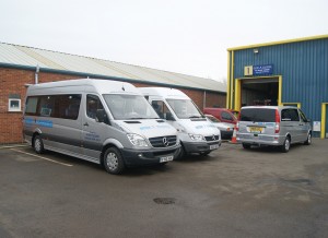 Two of its Mercedes-Benz Sprinter minibuses.