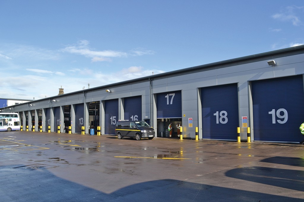 There are twenty bays on site, one of which is a specialist glass area. The van outside bay 16 is a roadside repair vehicle.