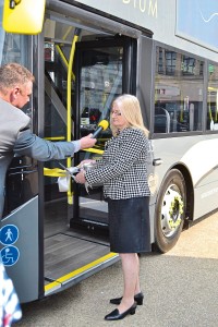 Cllr Christine Wright cuts the ribbon on one of the new specification vehicles. Note the 2017 silver heart behind her