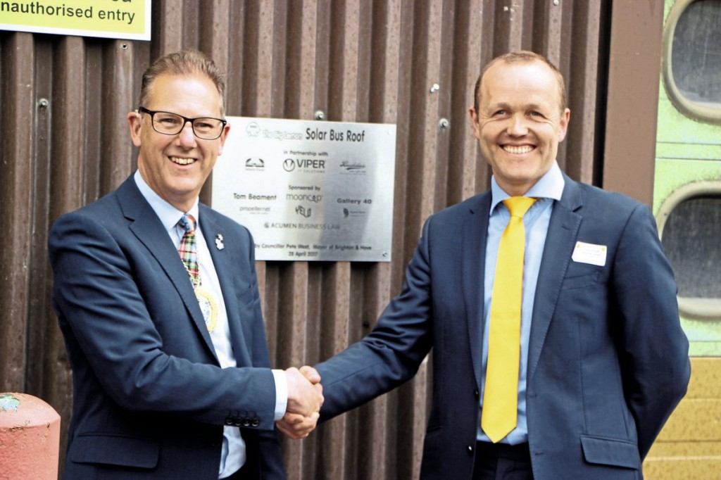 Brighton & Hove Mayor, Pete West in front of the plaque he and Tom Druitt unveiled celebrating the contribution of the company’s partners and sponsors