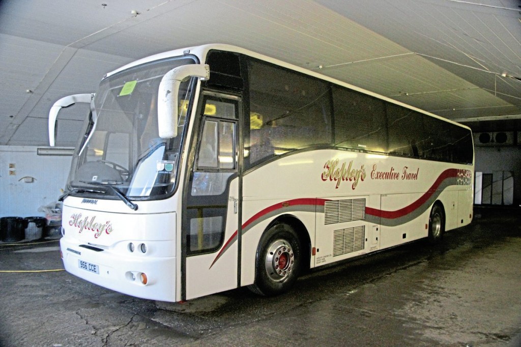 One of two late Volvo B10M Jonckheere Mistrals used on school work