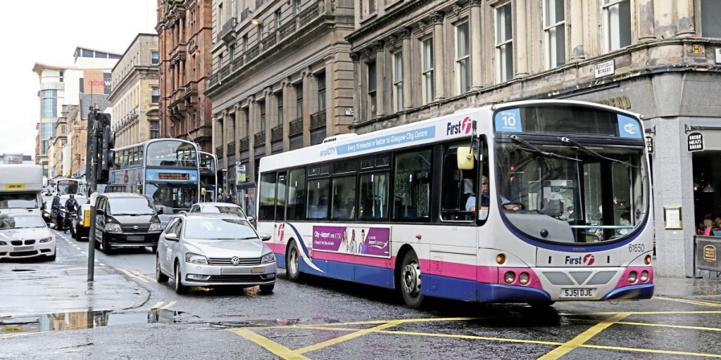 Traffic congestion has significantly reduced bus speeds in the centre of Glasgow. Vehicles edge their way down Renfield St
