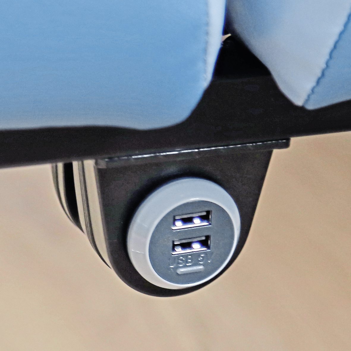 USB charging points are provided below each seat pair