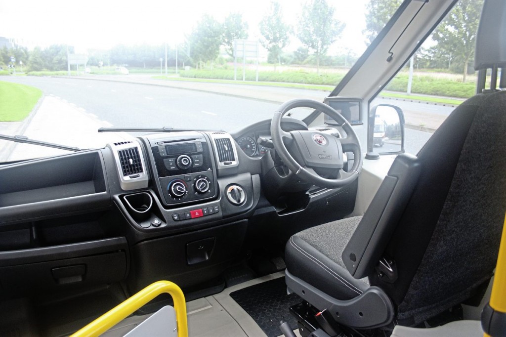 The cab layout. The large silver ringed switch is the drive selector