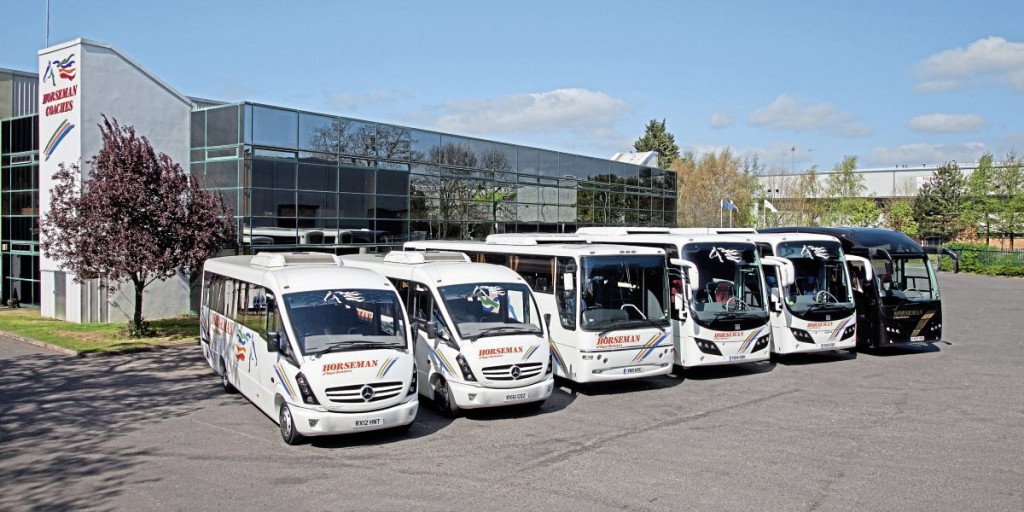 The depot and office block with a cross section of the Plaxton bodied coaches in the fleet in 2014, Cheetah, Profile, Panther and Elite