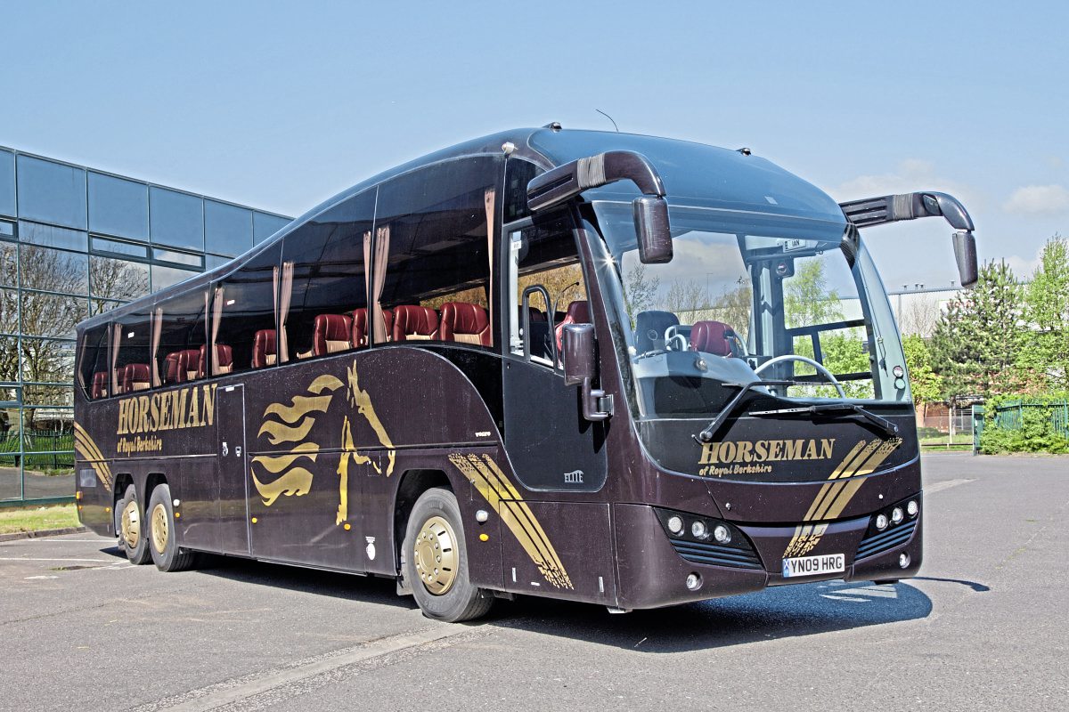 The three-axle high specification Plaxton Elite carries a distinctive livery with gold logos