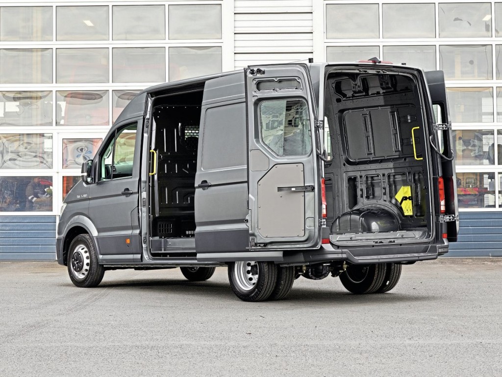 There is a sliding side door and fully opening rear doors