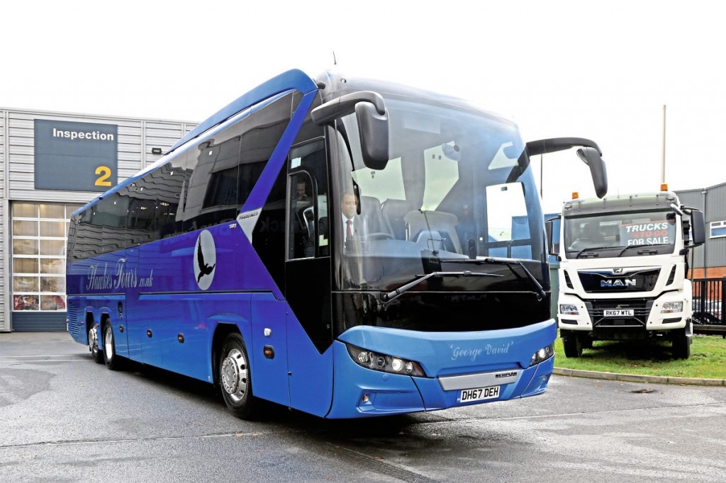 Hawkes Tours vehicles feature a distinctive blue fade colour scheme with a black on silver hawk motif