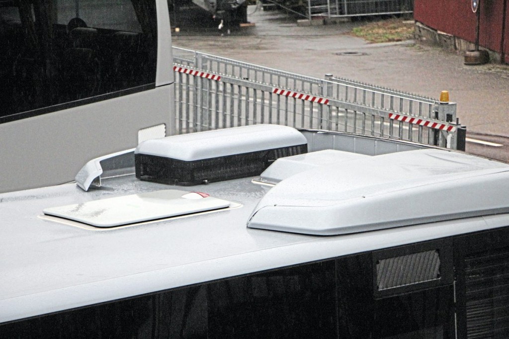 The super-capacitors are mounted within a silver topped black pod on the rear of the roof