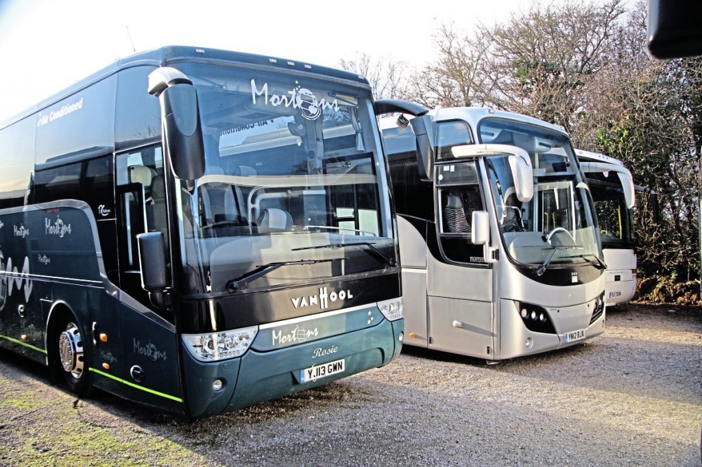 Some of the stock belongs to Allan and some is being handled on a brokerage basis. In the foreground, this DAF-powered 13-plate Van Hool TX16 Alicron, previously with Mortons, is one of his own. It has 57 seats and a toilet on two axles. Behind it, other coaches in the mix