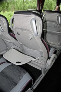 The rear of the seats on the 9900 we saw. UK examples will have simple drop-down tables, rather than these airline style units