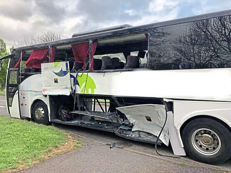 Bus and coach collide