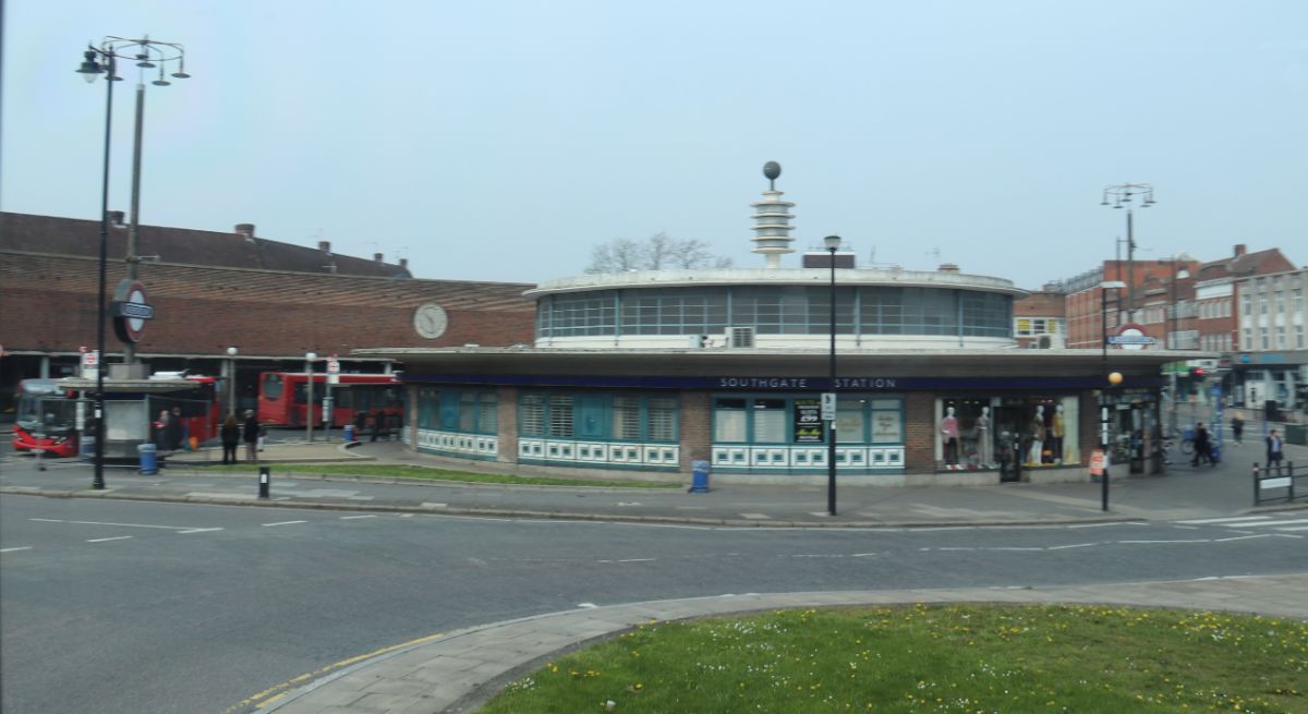 Southgate Station’s circular main building with the bus station beyond is seen from our approaching bus