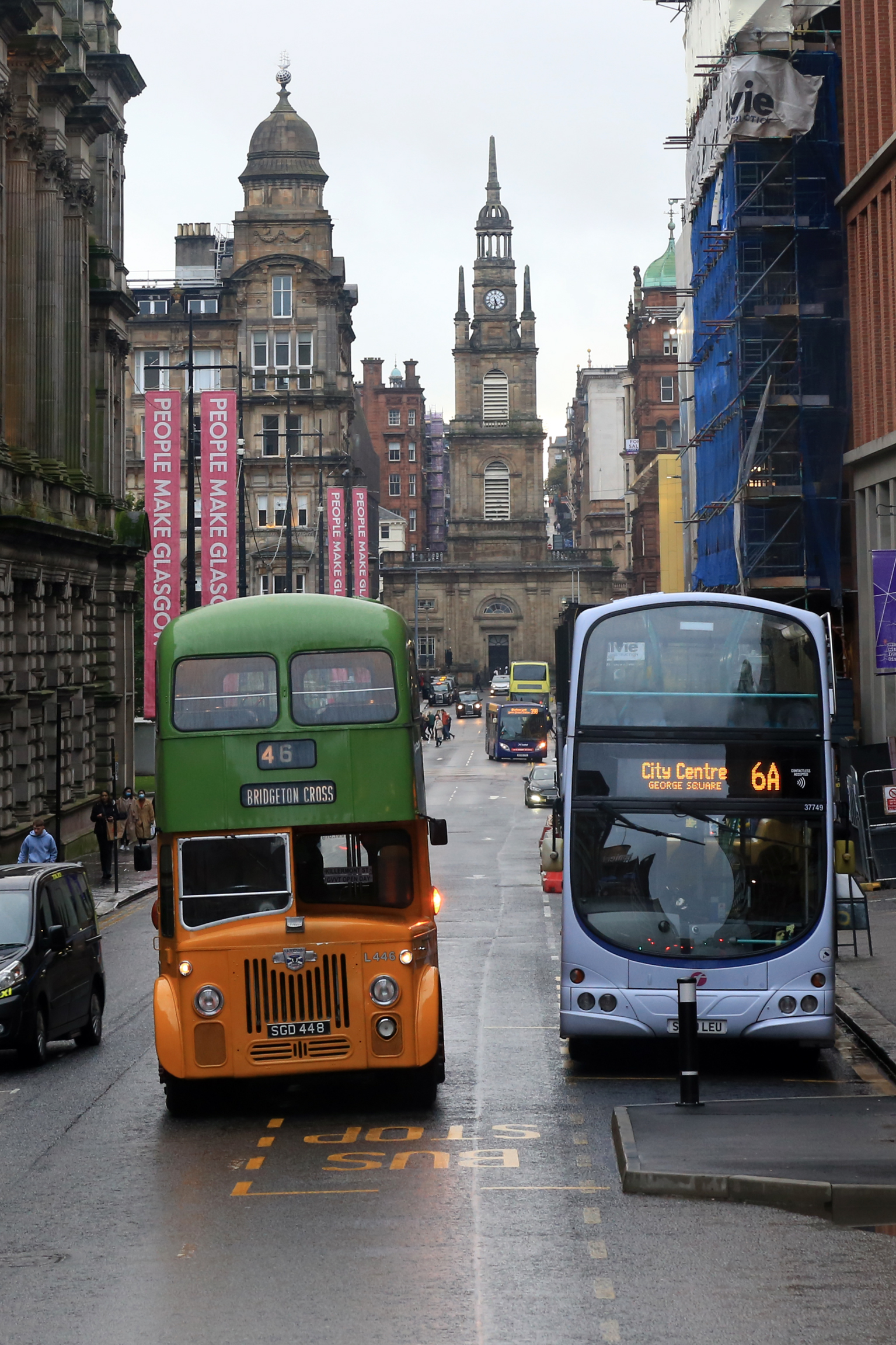 Amongst regular service buses, the 1960 Glasgow Corporation Alexander bodied Leyland PD3 leaves George Square on a late afternoon journey to back to Bridgeton
