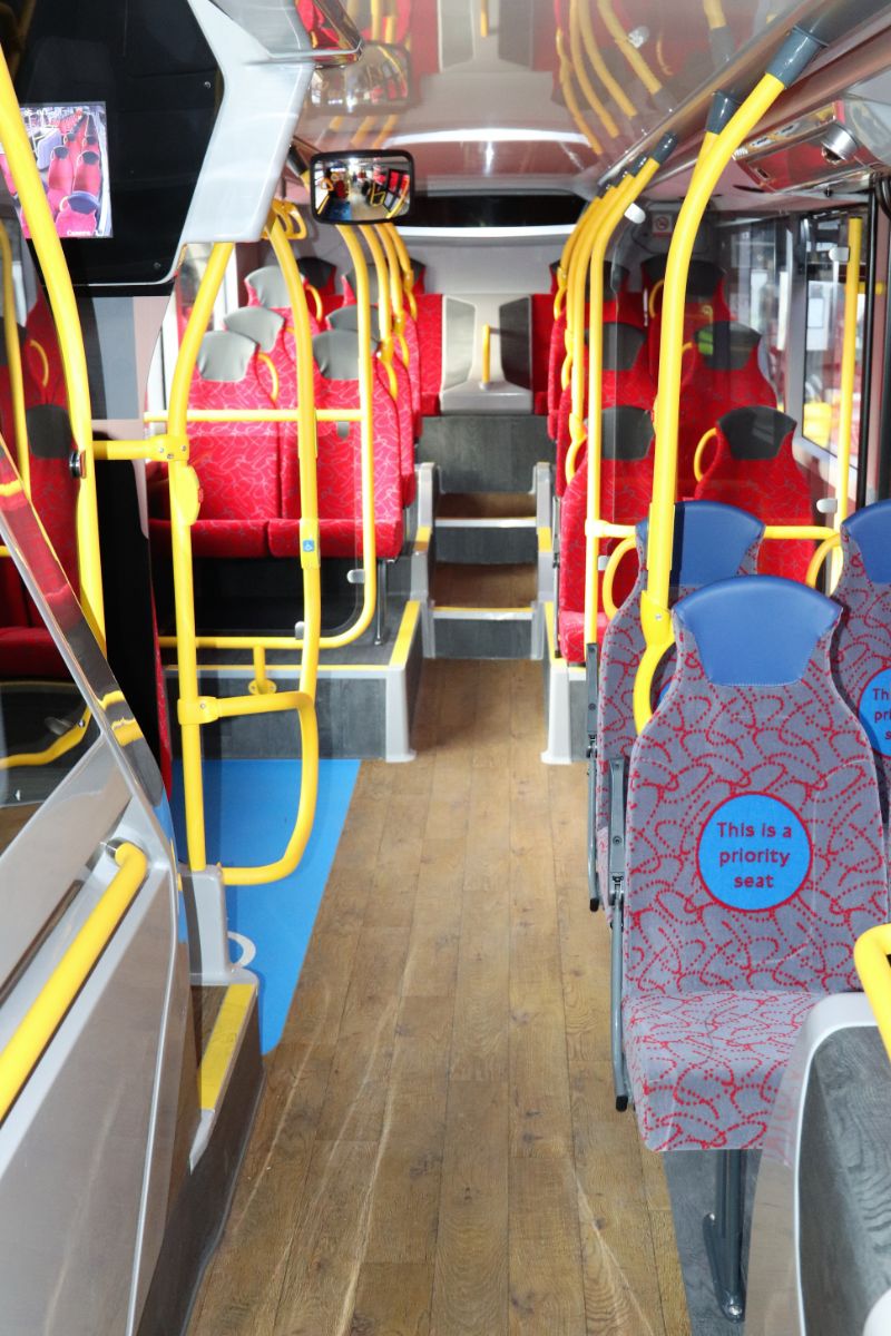 The lower deck showing the high back seats, contrasting priority seats and Altro ‘Tudor Oak’ wood effect flooring. Jon chose the latter because he wanted, ‘a hotel floor, not a hospital floor.’