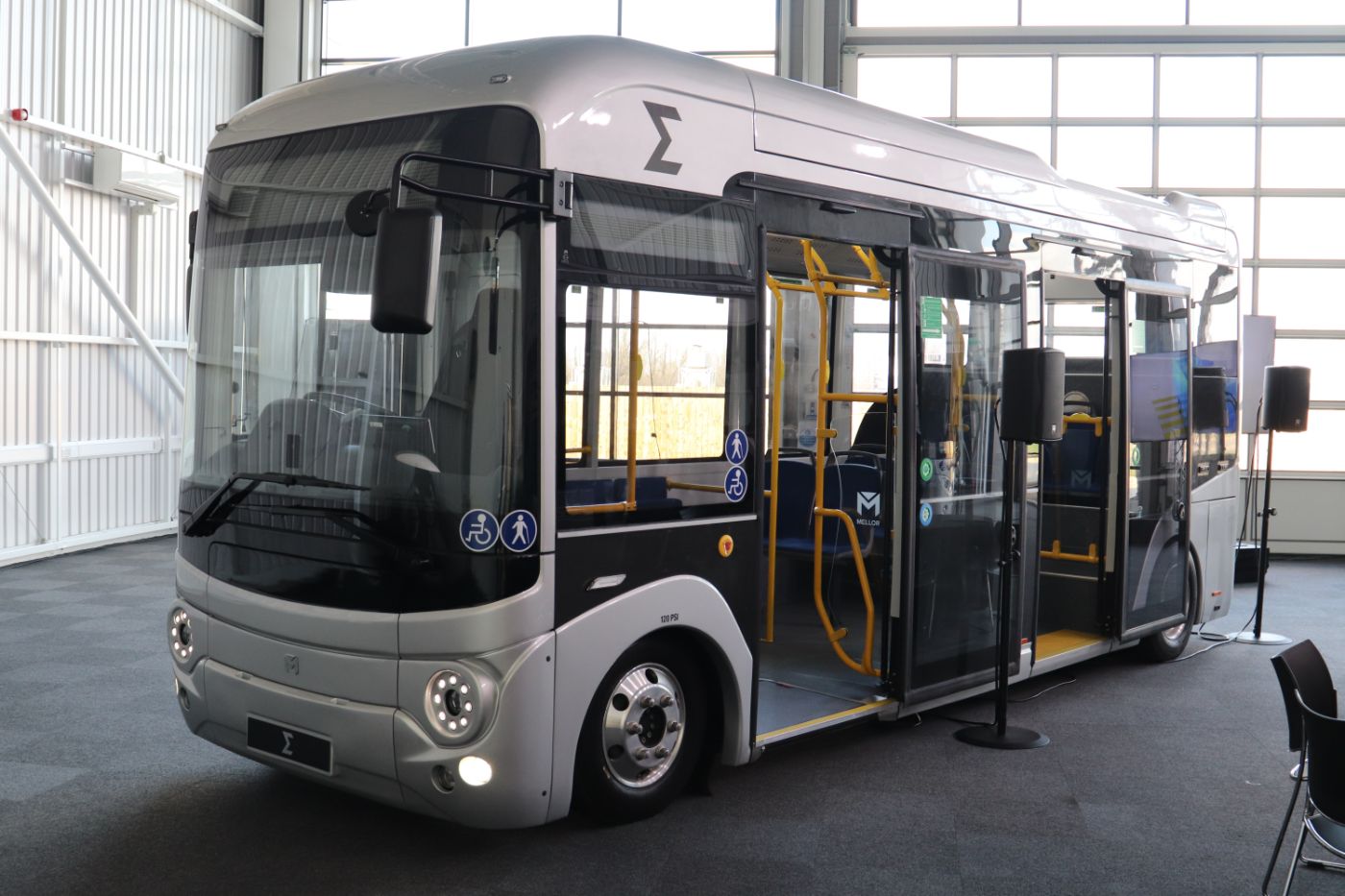 Shown with dual doors and a manual ramp in the forward door, the Sigma 7 seats a maximum of 12 and can carry up to 20 standees