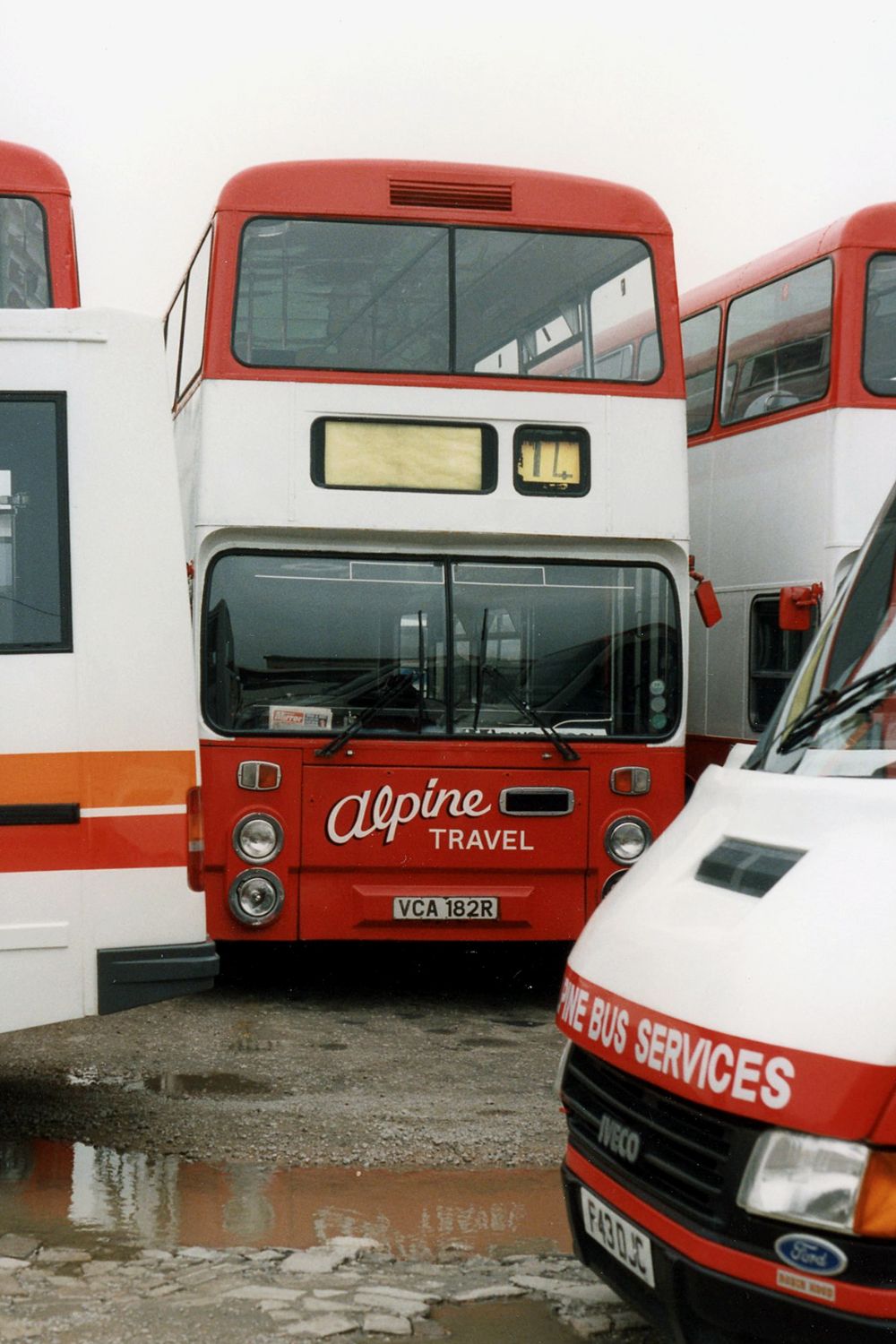 A selection of the bus fleet including one of the Iveco midibuses (Copyright Arnold Chave)