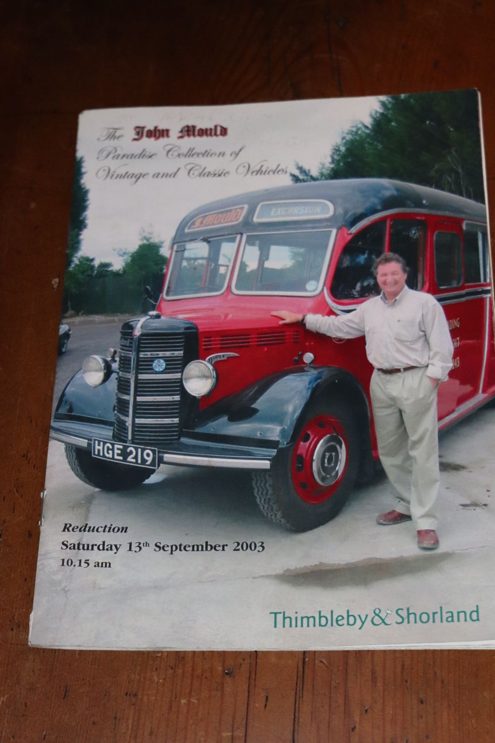 The cover of the 2003 auction catalogue that saw Ages Past acquire its first Bedford OB featuring the coach acquired